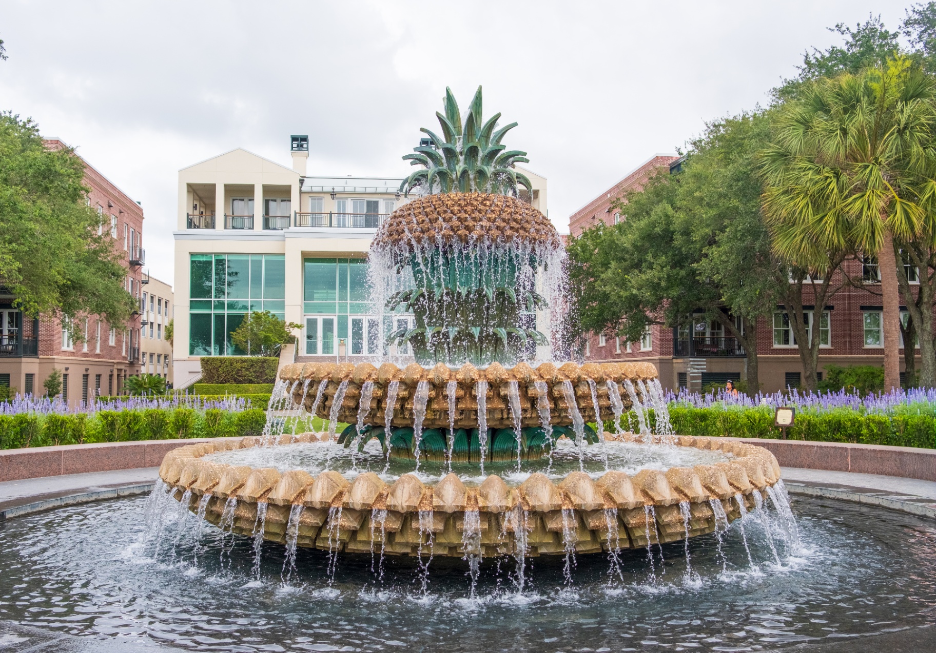 Charleston pineapple fountain with water spilling over its tiers